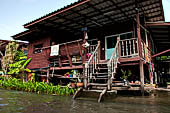 Scenery along the canal leading to Damnoen Saduak Floating Market. 